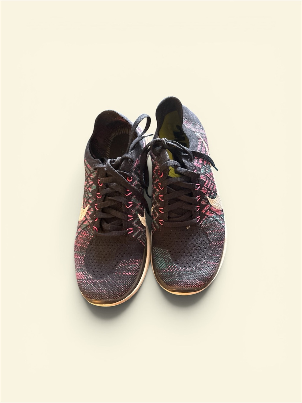 Nike Women's Black Knit Sneakers with Pink and Teal Accents